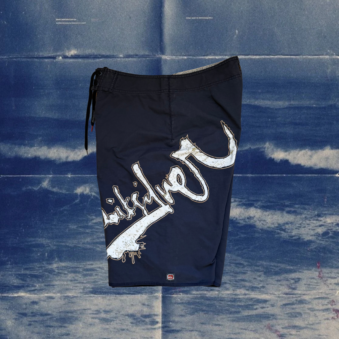 Quicksilver navy with white logo vintage boardies