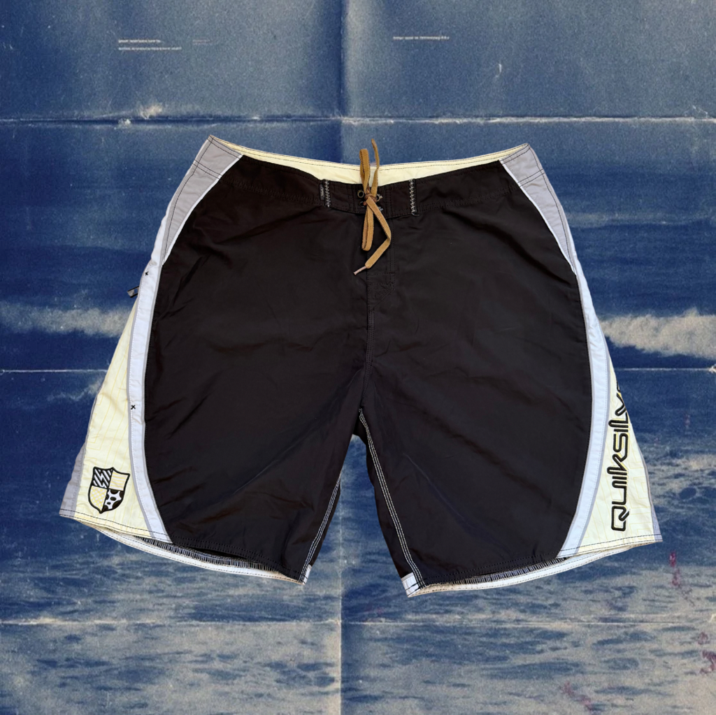 Quicksilver brown and yellow vintage boardies