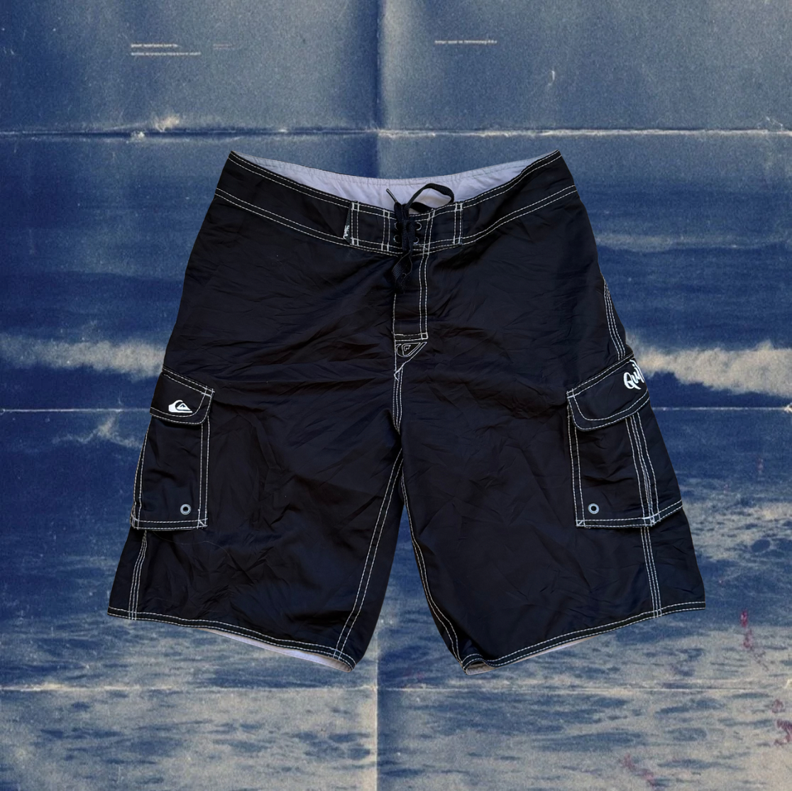 Quicksilver black with white stiches vintage boardies