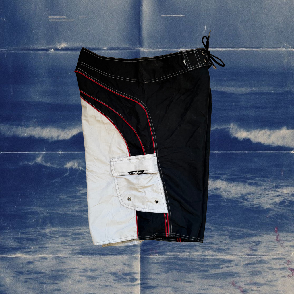 O’Neill black and light gray with red stiches vintage boardies