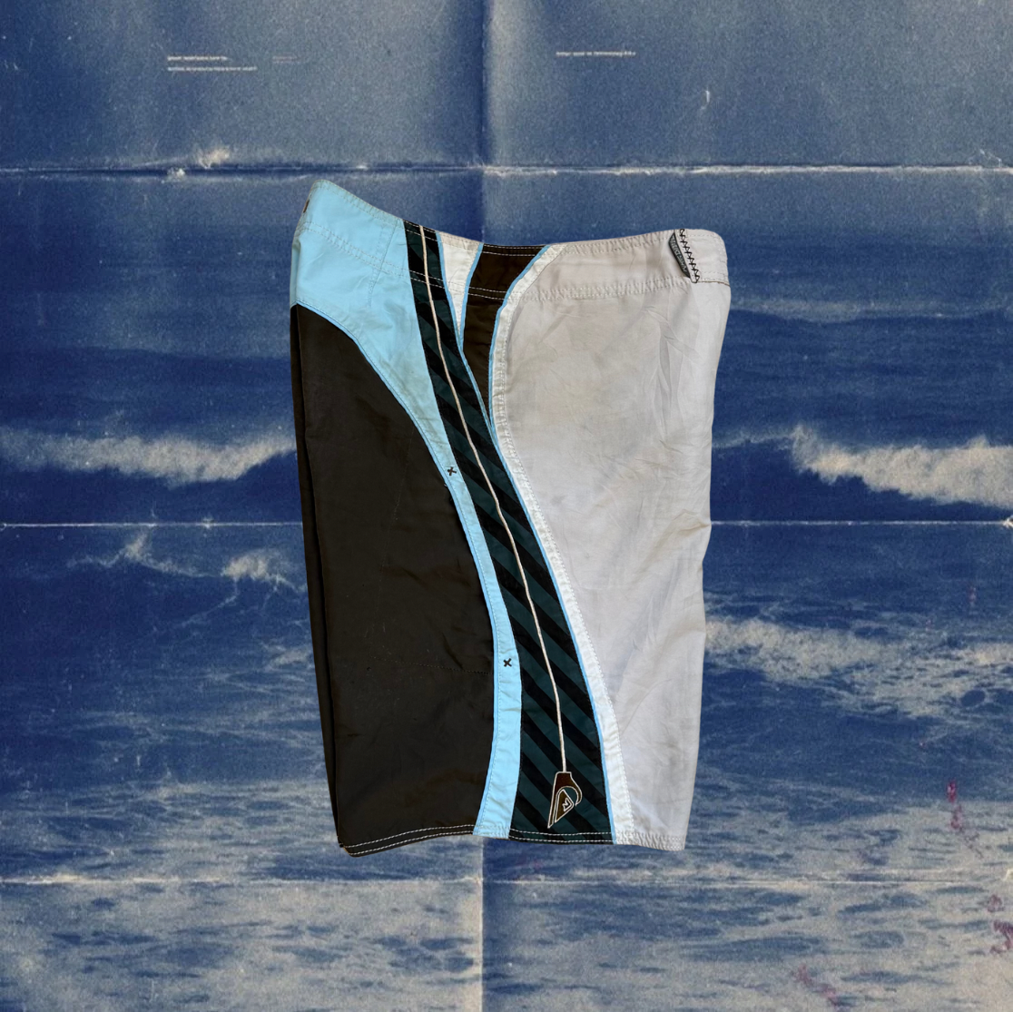 Quicksilver beige, brown and light blue vintage boardies