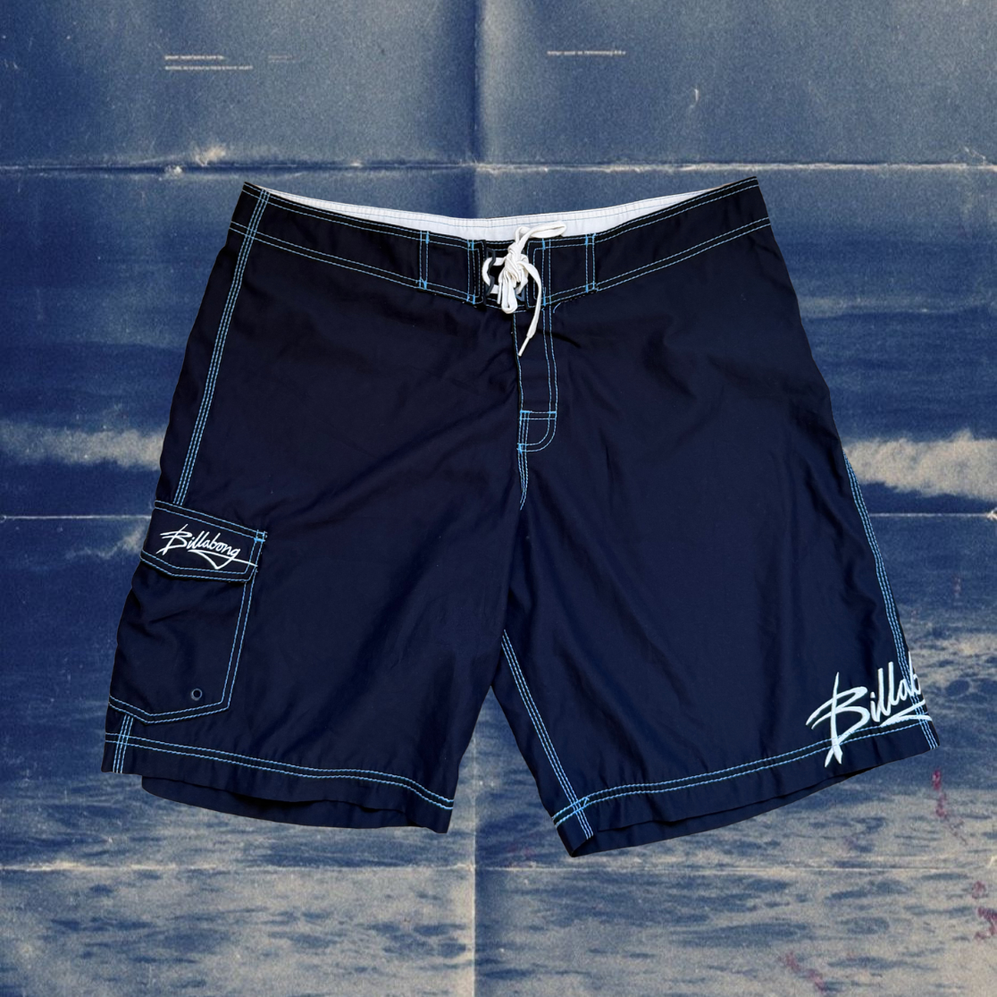 Billabong navy with light blue stiches vintage boardies