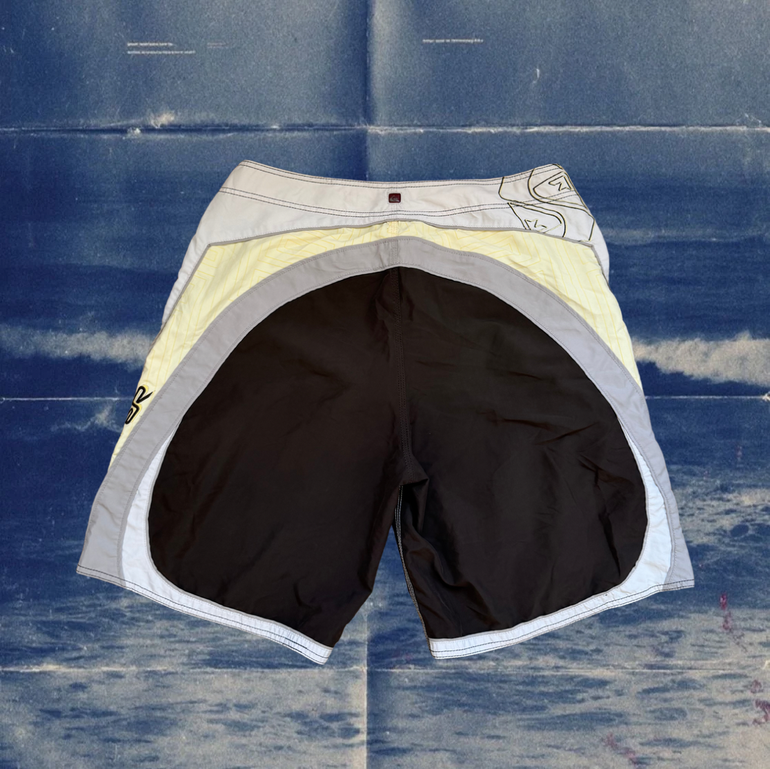 Quicksilver brown and yellow vintage boardies