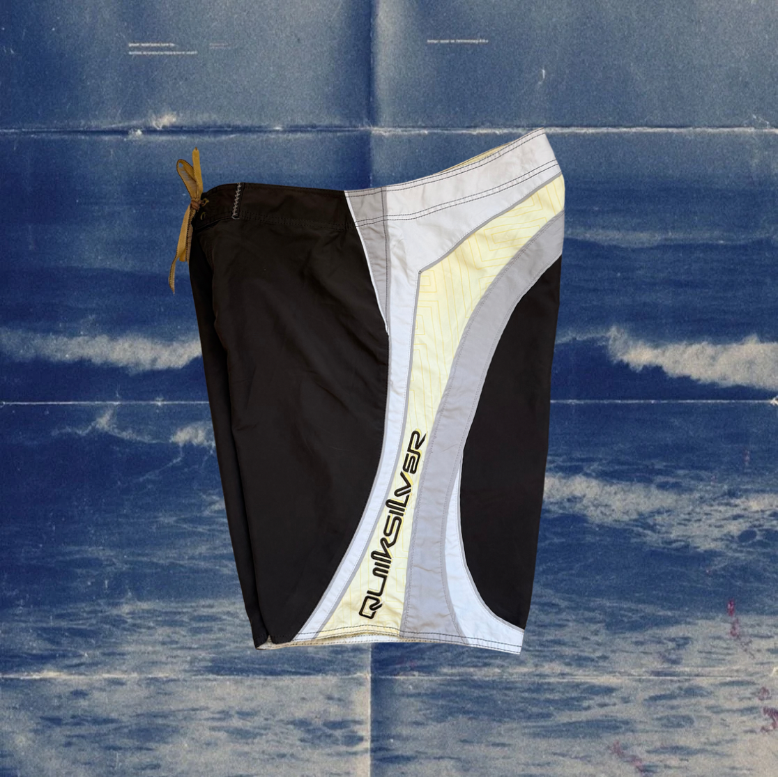 Quicksilver brown and yellow vintage boardies