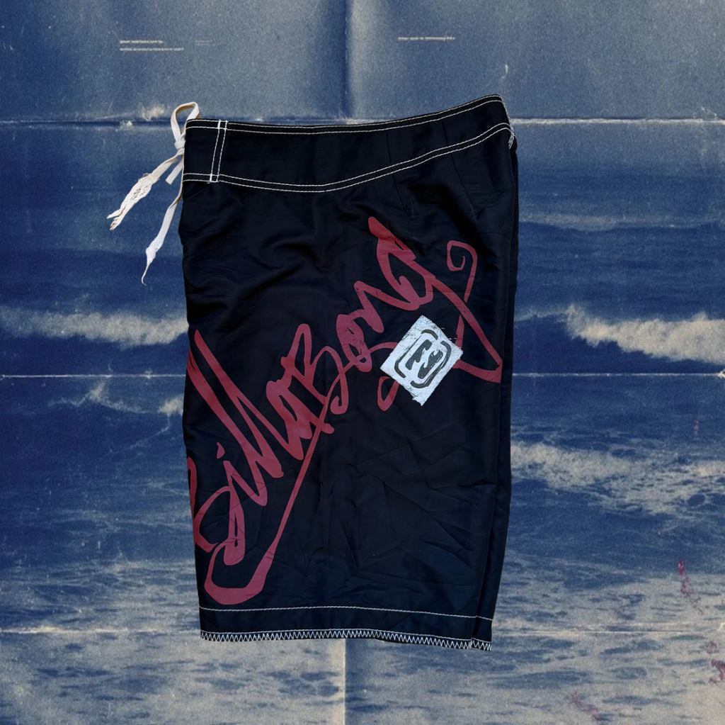 Vintage billabong bordies black with white stiches and red logo