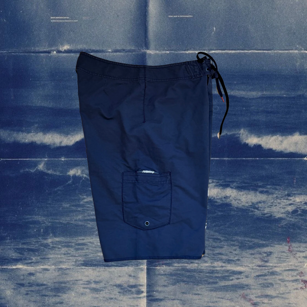 Quicksilver navy with white logo vintage boardies