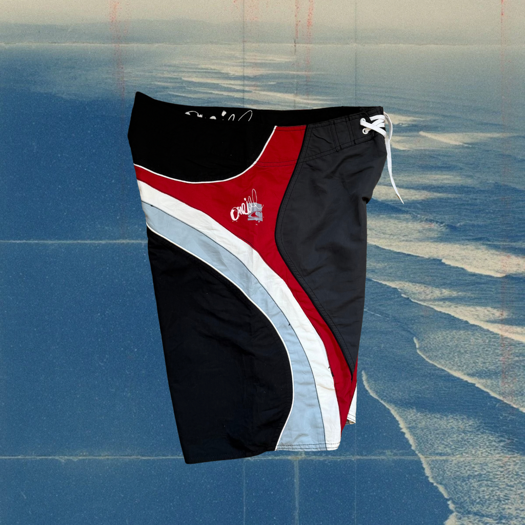 O’Neill superfreak curved multi panel black vintage boardies