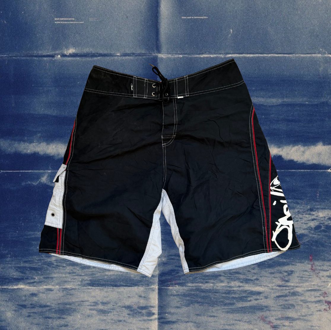 O’Neill black and light gray with red stiches vintage boardies
